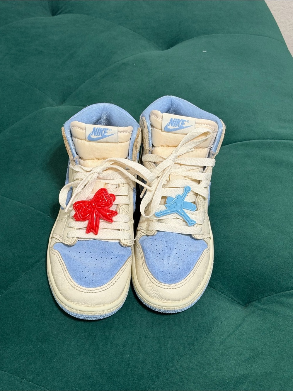 Jordan 1 Kids' High-Top Sneakers in Cream and Light Blue with Red Accent